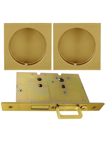 Premium Dummy Pocket-Door Mortise Lock Set with Square Pulls in Aged Brass.